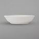 A white Tuxton China fruit bowl with an embossed design.