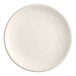 An Acopa ivory stoneware plate with a plain edge.