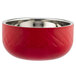 A red Bon Chef bowl with silver rim.