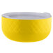 A yellow Bon Chef bowl with a white lid.