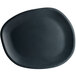 A black oval shaped Carlisle melamine platter.