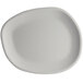 A white Carlisle melamine oblong platter with a curved edge.