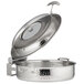 A close-up of a Bon Chef stainless steel brazier pan with a slow down hinged glass cover.