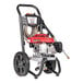 A red and black Simpson gas powered pressure washer with wheels.