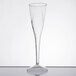 A clear plastic WNA Comet Classicware champagne glass with a curved stem.