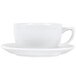 A CAC porcelain cappuccino cup and saucer on a white saucer.