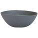 A dark grey slanted melamine bowl with matte speckles.