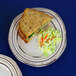 A sandwich and coleslaw on an Elite Global Solutions beach design melamine plate.