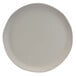 An Elite Global Solutions matte vanilla melamine plate with a small rim.