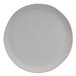 A white Elite Global Solutions round melamine plate with speckled specks.