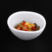 An Elite Global Solutions gray speckled melamine bowl filled with mixed vegetables.