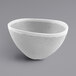 A white melamine bowl with speckled gray edges.