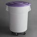A white round ingredient storage bin with wheels and a purple lid.