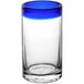 An Acopa Tropic clear cooler glass with a blue rim.