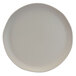 A matte vanilla melamine plate with a small rim on it.