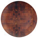 A round bamboo melamine plate with a checkered pattern.