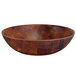 A round bamboo melamine bowl with a checkered pattern.