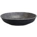 A black melamine oval serving bowl with a grey rim.
