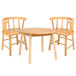 A Whitney Brothers wooden round children's table with two wooden chairs.