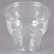A Fabri-Kal clear plastic sundae cup on a gray background.