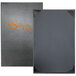 A black rectangular Tamarac menu cover with an orange corner and the words "Slysys Grill" in orange.