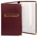 A red leather menu cover with gold trim and a clear pocket on the front.