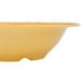 A yellow Venetian bowl with a colorful design on it.