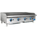 A Globe stainless steel gas charbroiler with three burners.