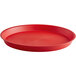 A red round plastic serving tray.