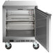 A Beverage-Air stainless steel undercounter freezer with a door open.