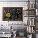 A MasterVision rustic chalkboard with an oak frame on a counter in a coffee shop.