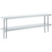 A white rectangular table with a stainless steel Advance Tabco double deck shelf on it.