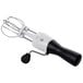 An OXO stainless steel manual crank egg beater with a black handle.