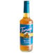 A Torani Sugar-Free Belgian Cookie flavoring syrup bottle with a blue label.
