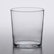 An Arcoroc old fashioned glass on a white background.