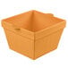 A square orange cast aluminum container with a handle.