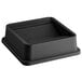 A Lavex black square trash can swing lid on a black tray.