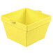 A yellow square cast aluminum container with a lid.