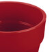 A Tablecraft red cast aluminum round condiment bowl with a lid.