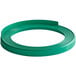 A green rubber band around a white circle.