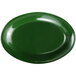 A multi-color oval melamine platter with a green circle in the middle.