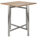 A Bon Chef oak square table top with metal legs.