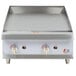 A Cooking Performance Group commercial gas griddle with two burners and two knobs.
