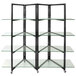 An Eastern Tabletop black stainless steel rolling buffet with glass shelves on wheels.