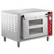 A stainless steel Avantco countertop double deck pizza oven with two doors.