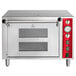 A silver Avantco double deck countertop pizza oven with red knobs and dials.