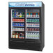 A Turbo Air refrigerated merchandiser with drinks inside.
