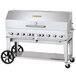 A large silver Crown Verity outdoor grill with wheels.