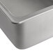 A Vollrath stainless steel deep spillage pan in a metal container.