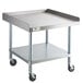 A Regency stainless steel equipment stand with wheels and an undershelf.